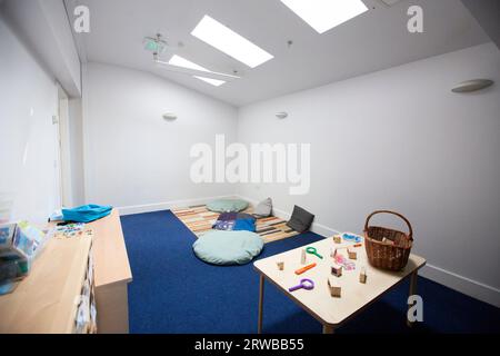 Nursery classroom scene for primary aged school children full of children's activities. Stock Photo