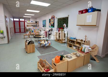 Nursery classroom scene for primary aged school children full of children's activities. Stock Photo