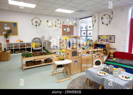 Nursery classroom scene for primary aged school children full of children's activities. Stock Photo