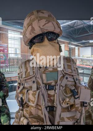 A No 5 Desert Combat Dress worn by British troops in 2011 in Afghanistan on display in the Royal Engineers Museum in Gillingham, Kent, UK. Stock Photo