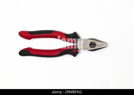 Wire pliers, also known as combination pliers or lineman's pliers, are versatile hand tools designed for gripping, bending, twisting, and cutting wire Stock Photo