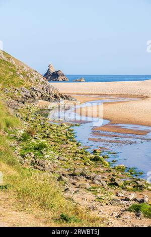 Evening light on Church Rock, Broad Haven beach, part of Stackpole National Nature Reserve,  in the Pembrokeshire Coast National Park, West Wales UK Stock Photo