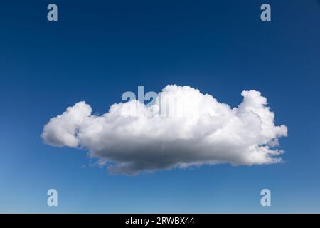 Blue summer sky with single cumulus cloud natural background with copy space Stock Photo