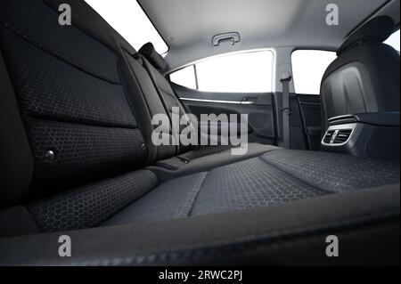 Cloth modern car interior of back seats with isolated windows side view Stock Photo