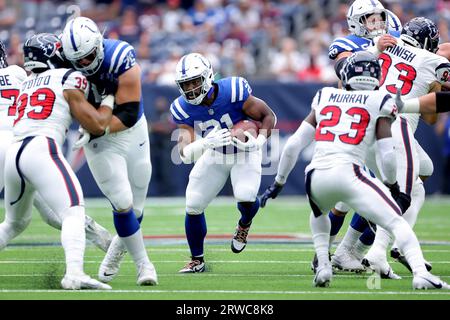 December 26, 2022: Los Angeles Chargers safety Alohi Gilman (32) trips up  Indianapolis Colts running back Zack Moss (21) during NFL game in  Indianapolis, Indiana. John Mersits/CSM/Sipa USA.(Credit Image: © John  Mersits/Cal