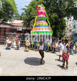 Chennai, India. 18th Sep, 2023. Women carrying pots of milk on their heads, known as paal kudam, from Muppathaman Temple, T.Nagar, Chennai, while a man carrying a heavy stuff on his head dancing & balancing the stuff accompanied by drums, trumpets and Crackers, ahead of the Pal Kudam procession by women folks (devotees). Muppathamman is another incarnation of Goddess Dhurga - a hindu Goddess. Credit: Seshadri SUKUMAR/Alamy Live News Stock Photo