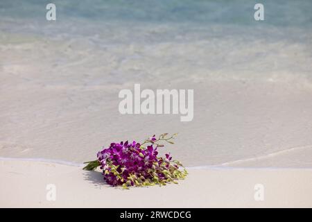 Beautiful bridal bouquet on Maldives beach. High quality photo Stock Photo