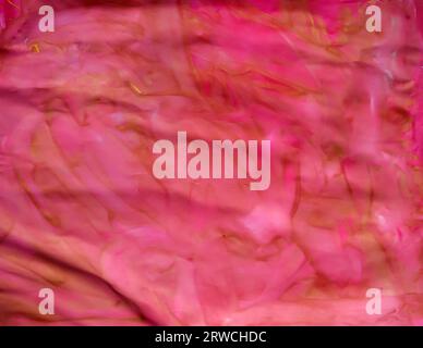 sheet of paper painted with colorful water-based paints, visible brush strokes, abstract colorful background for various projects, predominance of pin Stock Photo