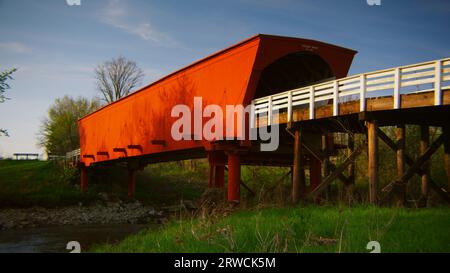 The famous Roseman covered bridge on a beautiful spring evening in Madison County Iowa. Stock Photo