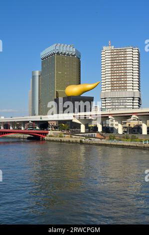 The most recognizable Asahi Group Holdings, Ltd. headquarters designed by Philippe Starck, Tokyo JP Stock Photo