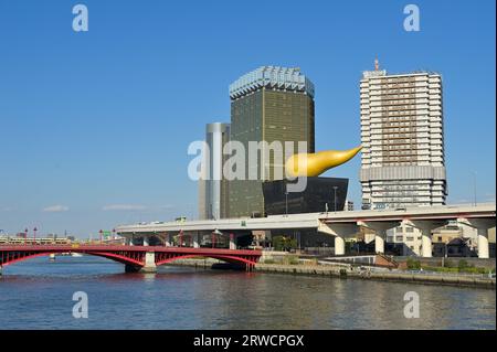 The most recognizable Asahi Group Holdings, Ltd. headquarters designed by Philippe Starck, Tokyo JP Stock Photo