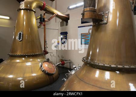 The Copper Pot Stills (a Wash Still and a Spirit Still) at the Royal Lochnagar Distillery near Balmoral on Royal Deeside Stock Photo