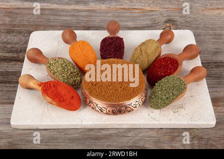 Seven types of spice mixture is an aromatic spice that is indispensable in Turkish cuisine. A mixture of dried red peppers and other spices. Stock Photo
