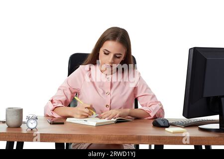 businesswoman taking notes, doing market research working in office Stock Photo