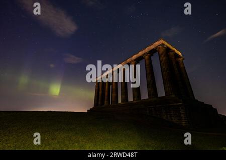 Edinburgh, United Kingdom. 18 September, 2023 Pictured: The aurora borealis (Northern Lights) are visible over the National Monument on Edinburgh's Calton Hill. Credit: Rich Dyson/Alamy Live News Stock Photo