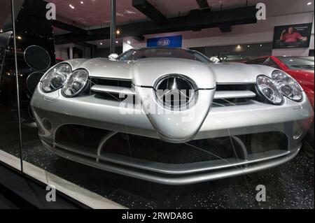 Mercedes Benz sports car in auto dealer window on Sunset Blvd. in Beverly Hills, CA Stock Photo