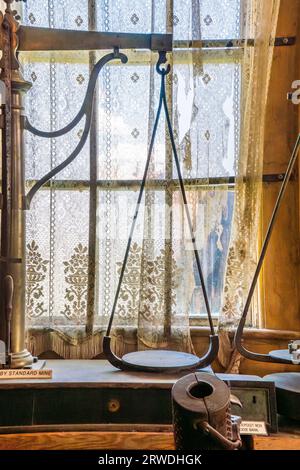 19th century balance scale in a window in the Bodie ghost town in ...