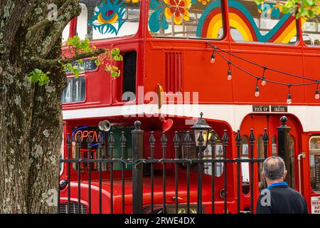 The iconic red double decker bus in Downtown Asheville, North Carolina, houses the popular Double D's Coffee & Desserts. (USA) Stock Photo