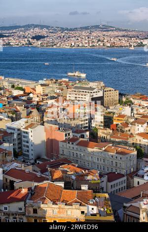 Istanbul cityscape from above in Turkey, Bosphorus Strait between Beyoglu (on the first plant) and Uskudar (far end) districts, late afternoon Stock Photo