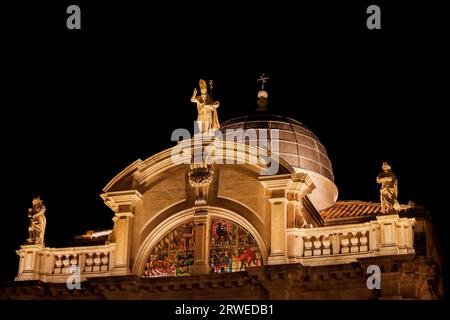 Church of St. Blaise at night in Dubrovnik, Croatia, Baroque architecture from 1715, cupola, semicircular gable with three statues, Saint Blaise Stock Photo