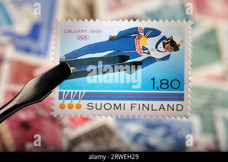Finnish commemorative stamp from 1988. Matti Nykaenen, the ski jumper that won three gold medals in the 1988 olympic winter games in Calgary Stock Photo