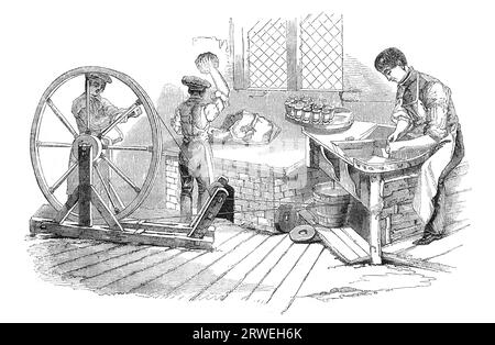 A Day at the royal porcelain-works, Worcester: Potters wheel, Thrower, Ball-Maker and Wheel-Turner at work. Engraving from a british magazine printed Stock Photo