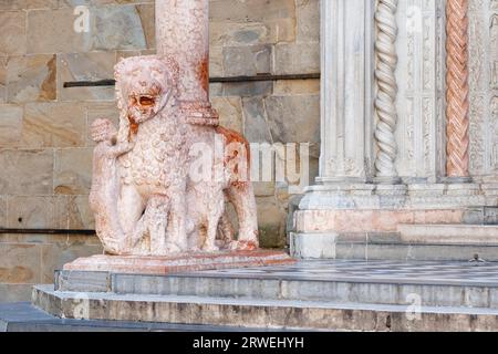 The lions of the porch on the transept facade of the Basilica of Santa Maria, Maggiore in Bergamo, which was created around 1350 Stock Photo