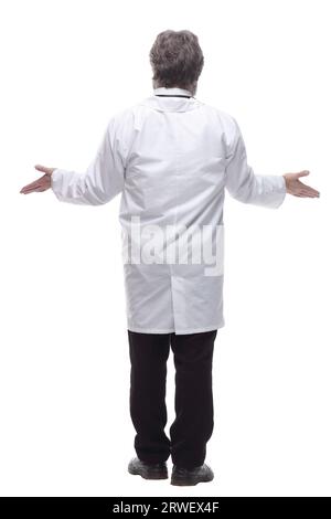 senior doctor reading an ad on a large white screen. Stock Photo