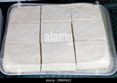 Korean food at Nambu Market in Jeonju, South Korea. Fresh tofu blocks. Stock Photo