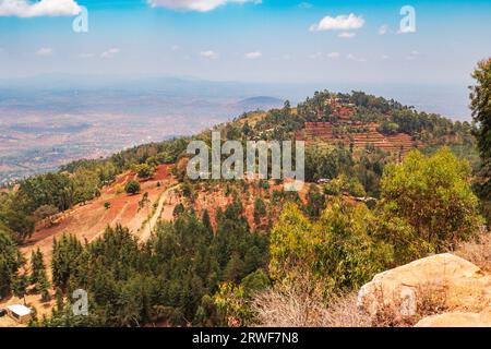 Aerial view of rural African Landscape with rock formations against valley and mountains in Makunei County, Kenya Stock Photo