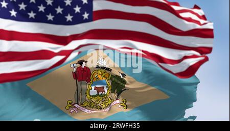 Delaware state flag waving with the national american flag. Yellowish-beige rhombus shape with the state coat of arms on a pale blue background. 3d il Stock Photo