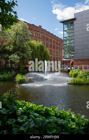 Rochdale Canal Lake situated beside the Bridgewater Hall in the middle of the city of Manchester, England. Stock Photo