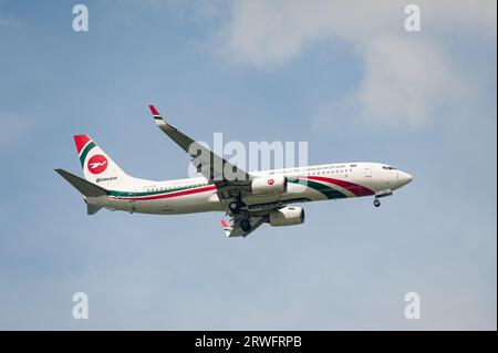 15.07.2023, Singapore, Republic of Singapore, Asia - A Biman Bangladesh Airlines Boeing 737-800 passenger aircraft with the registration S2-AEW approa Stock Photo