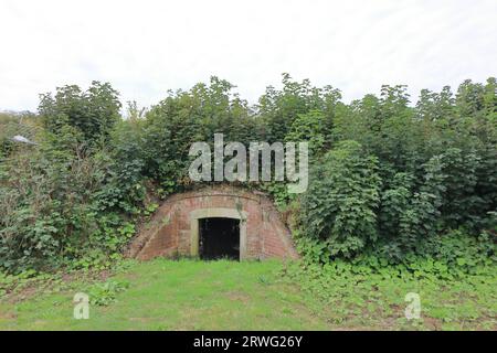 Gosport, England. September 16th 2023. A brick structure concealed by earthworks. Gosport's Bastion Number 1 was part of an elaborate earthwork fortification known as the Gosport Lines. The Lines were built between the 17th and 19th centuries and surrounded the town and harbour. They were part of an overall defence mechanism for the Portsmouth area. Stock Photo