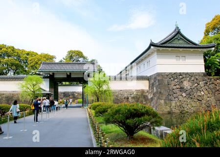 Tourists at Entrance of Imperial Palace in Tokyo Japan Stock Photo