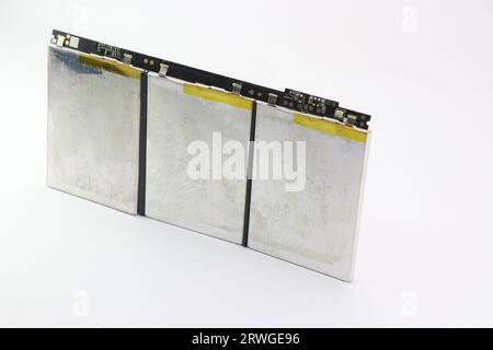 Lithium polymer battery arranged in an order kept on a white background. Modern laptops are powered by li-po battery Stock Photo