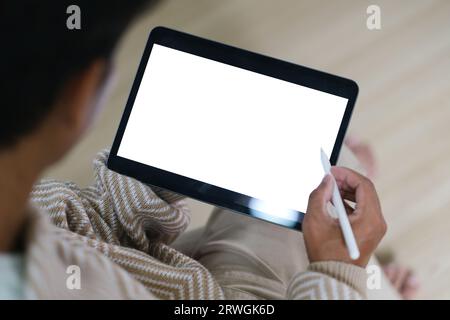 Close-up image a worker man using his digital tablet. Stock Photo