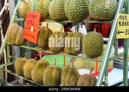 Many durian fruits on a stall in the Kuala Lumpur market Stock Photo