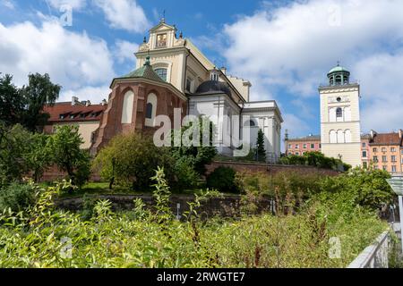 Polish Church of St. Anne. Old architecture landmark. Street outdoor. Poland, Warsaw - July 30, 2023. Stock Photo