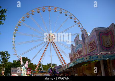 Arnsberg, NRW, Germany - 09 10 2023, Ferris wheel at a funfair, blue sky Stock Photo