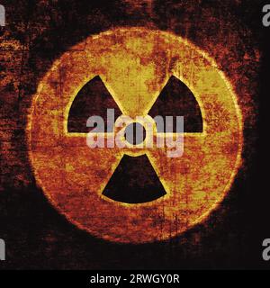 Radiation sign, yellow on black. Nuclear hazard emblem, grunge textured. Radioactive threat symbol Stock Photo