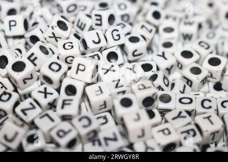 white dice, cubes on letters image Stock Photo