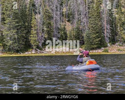 Fisherman floating on a Scottish Loch using a float tube. SCO 9129 Stock  Photo - Alamy