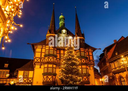 Market square historic city hall Wernigerode in Harz region of Sachsen-Anhalt Land Germany evening night sky. Christmas decoration in old European Stock Photo