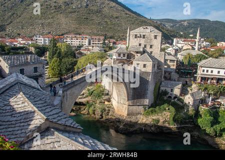 View of Stari Most (old bridge) in Mostar Village with Neretva River, Bosnia Herzegovina, 16th-century Ottoman bridge in the city of Mostar in Bosnia Stock Photo