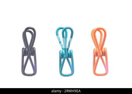 coloured pegs hanging closeup on a pure white background Stock Photo