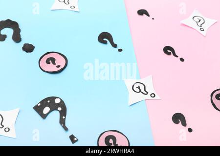 Different question marks on color background Stock Photo