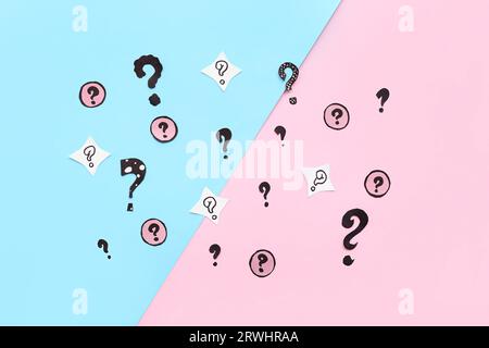 Different question marks on color background Stock Photo