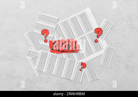Quiz forms with paper quiz card and question marks on white background Stock Photo