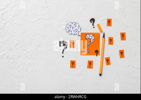 Quiz card with bubble speech and different question marks on white background Stock Photo